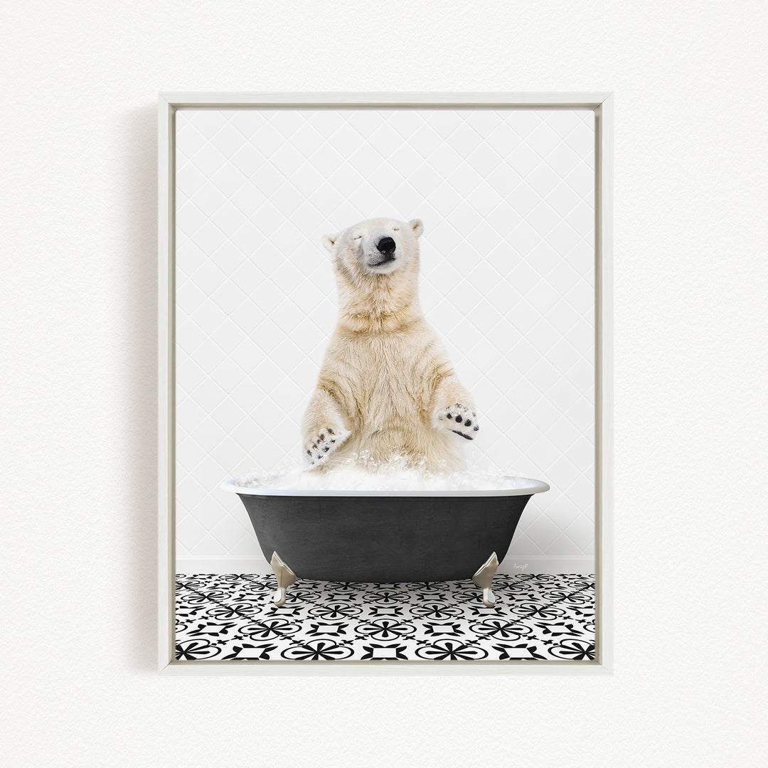 A polar bear standing in a black bathtub filled with water, with its paws raised in the air.