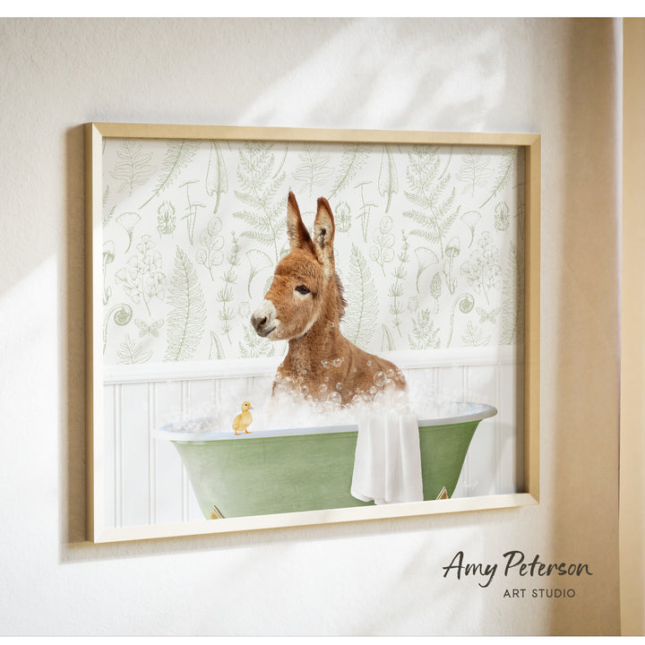A donkey is sitting in a green bathtub, surrounded by bubbles, with a small yellow duck nearby.