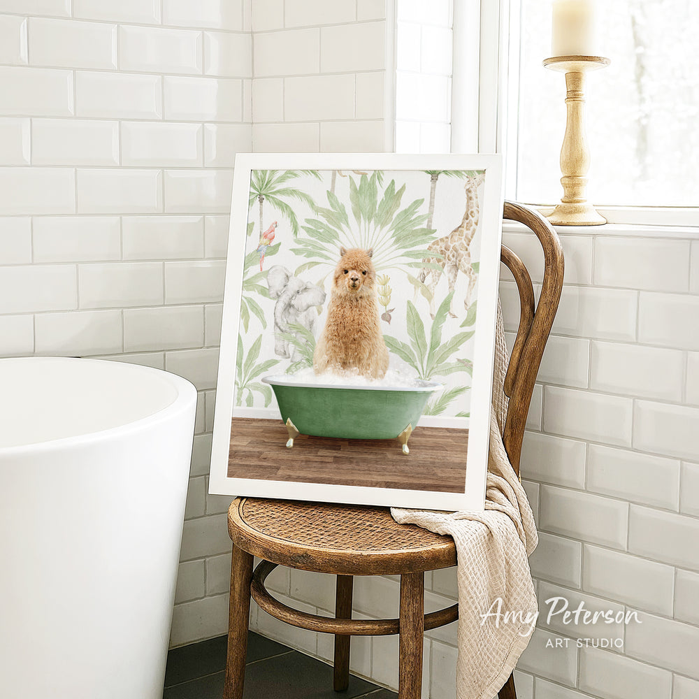 A framed print of a dog sitting in a bathtub is displayed on a wooden chair in a bathroom setting.
