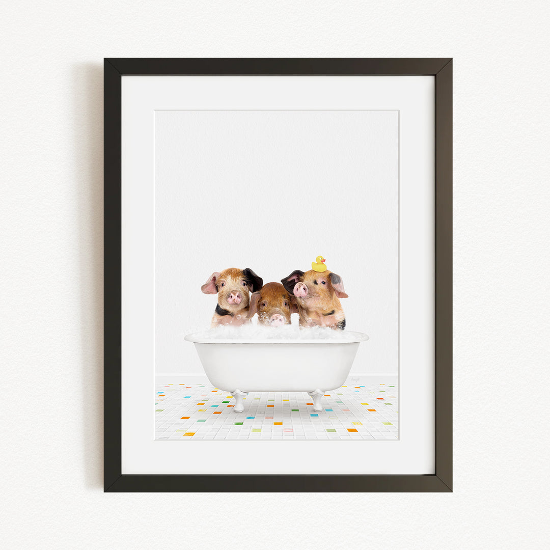 Three adorable pigs sitting in a white bathtub, enjoying a relaxing bath together.