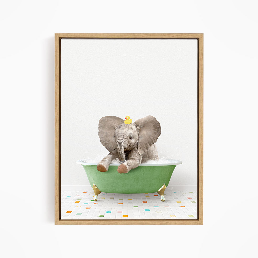 A baby elephant sitting in a green bathtub, surrounded by colorful tiles on the floor.
