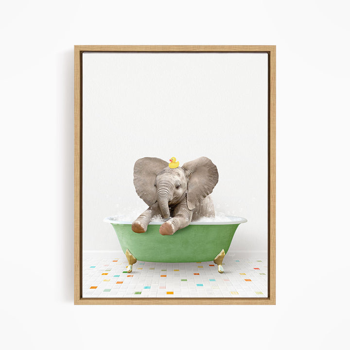 A baby elephant sitting in a green bathtub, surrounded by colorful tiles on the floor.