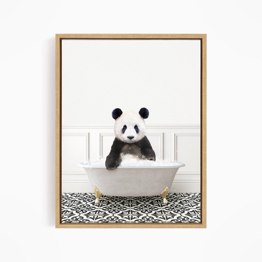 A panda bear sitting in a white bathtub filled with bubbles, surrounded by a black and white patterned floor.