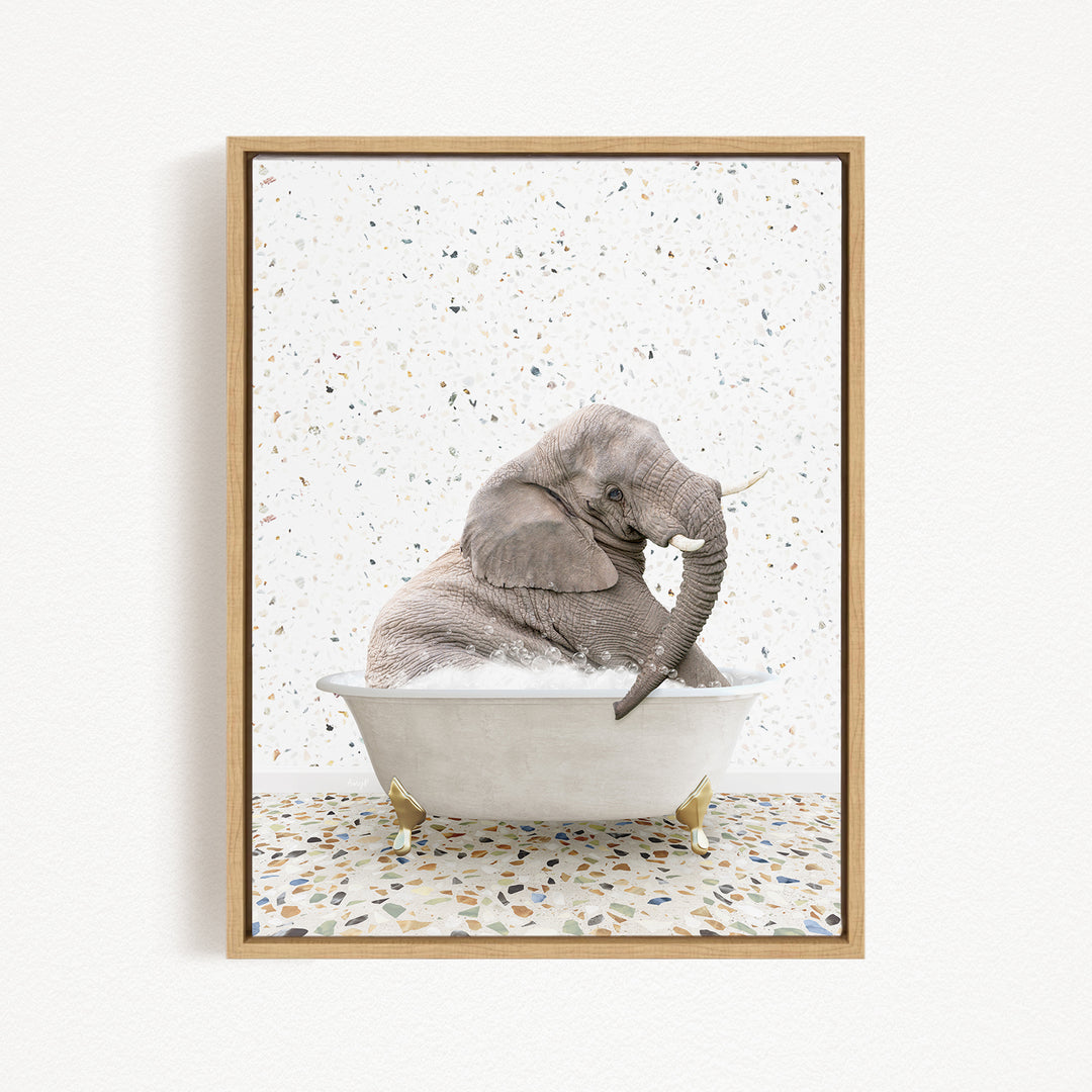 A gray elephant is sitting in a white bathtub, surrounded by a speckled pattern on the floor.