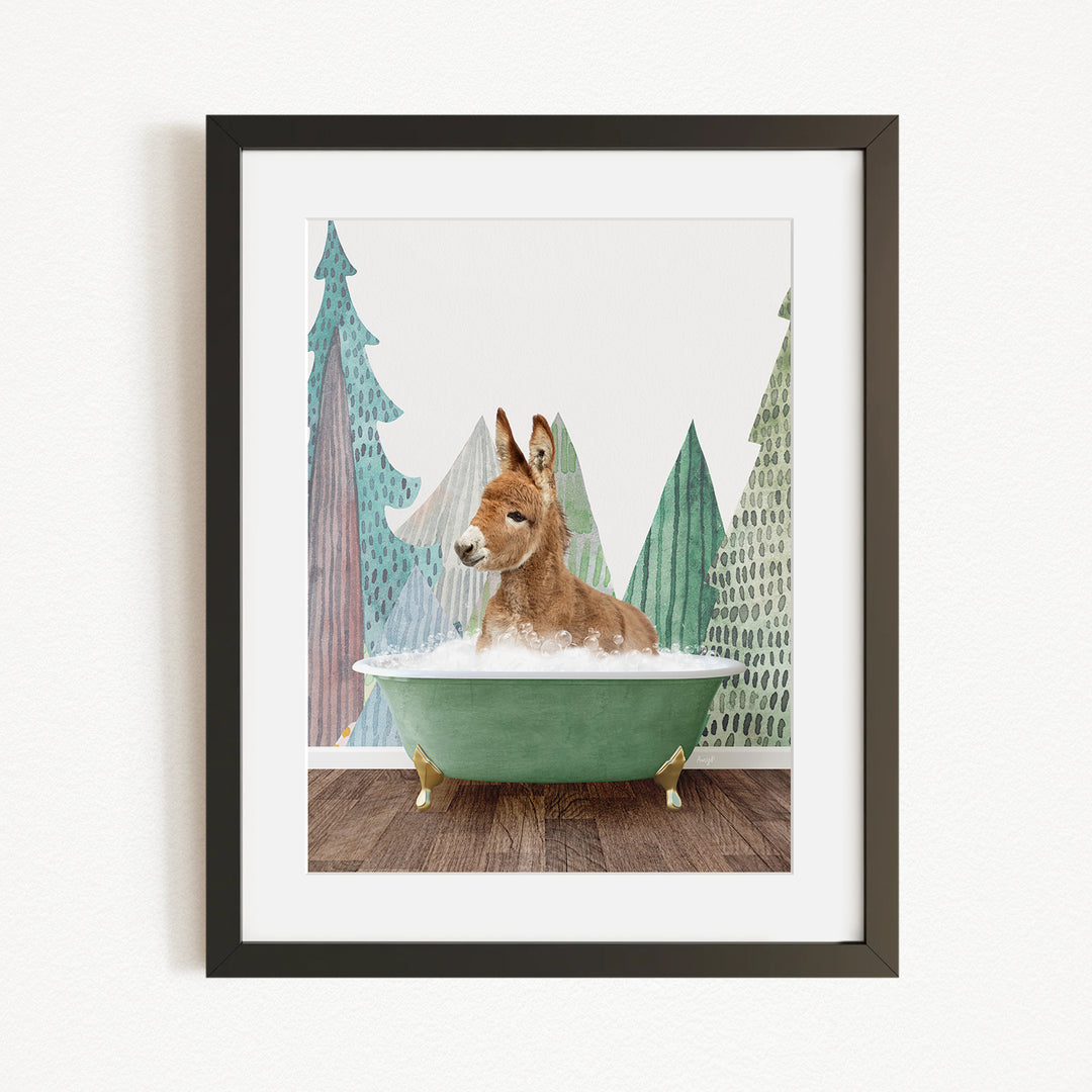 A brown kangaroo is sitting in a green bathtub, surrounded by a forest scene with trees and a snowy landscape.