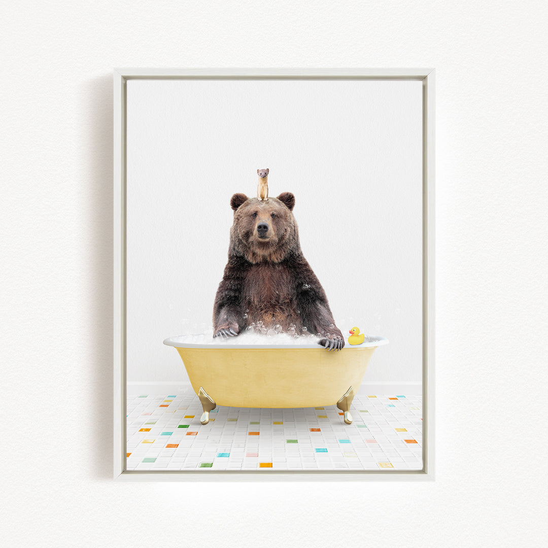 A brown bear sitting in a yellow bathtub, surrounded by colorful tiles on the floor.