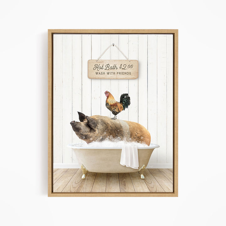 A framed image depicting a pig sitting in a bathtub, with a rooster perched on its back, and a sign above the bathtub stating "Hot Bath $2.00 WASH WITH FRIENDS".