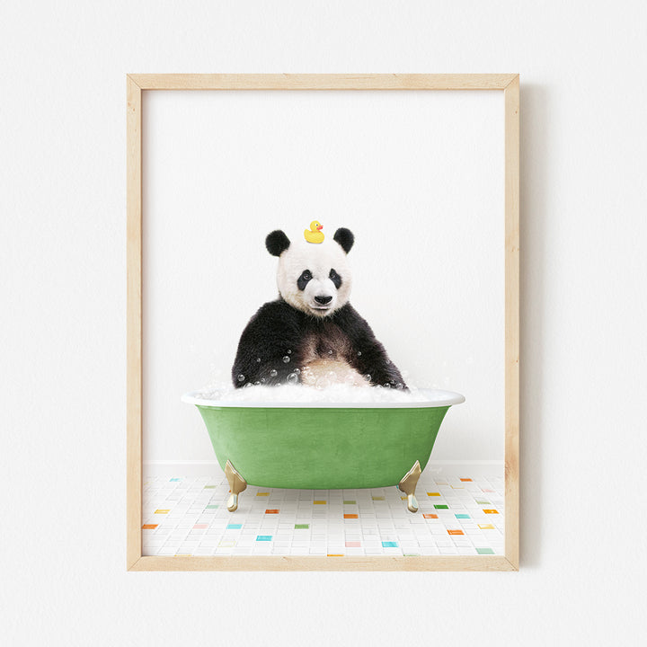 a panda bear sitting in a green bath tub