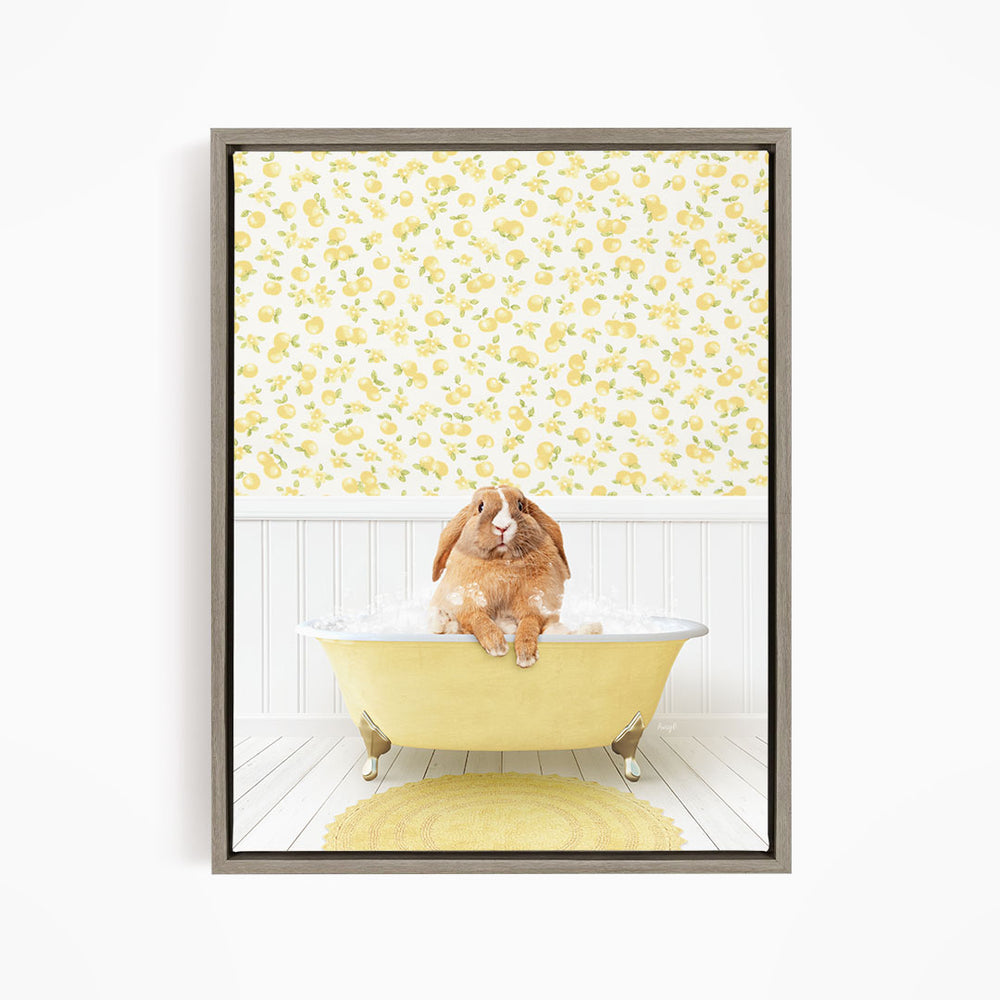 A brown rabbit sitting in a yellow bathtub filled with water, surrounded by a yellow floral pattern on the wall behind it.