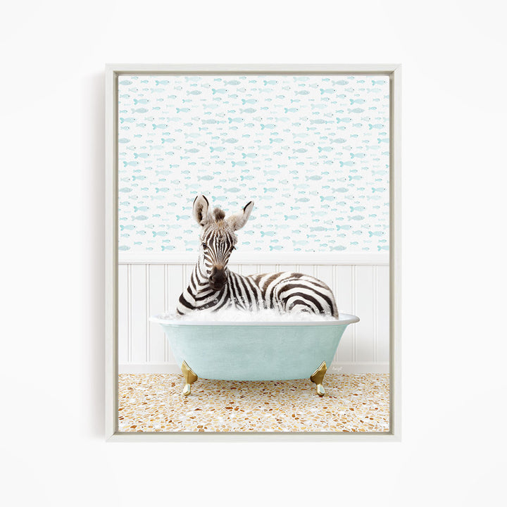 A zebra is sitting in a light blue bathtub, surrounded by a pattern of small fish.