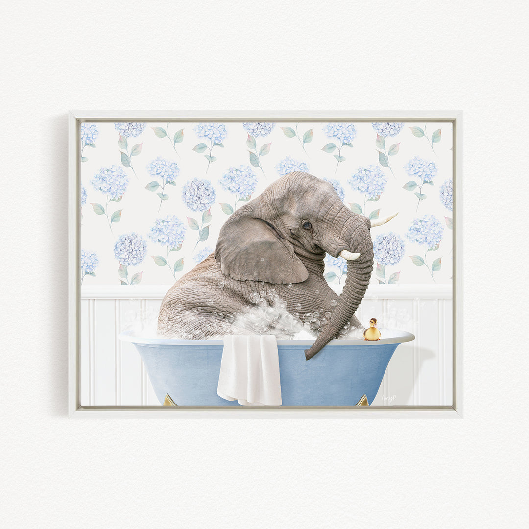 A gray elephant is sitting in a blue bathtub filled with water, surrounded by blue flowers on the wall behind it.