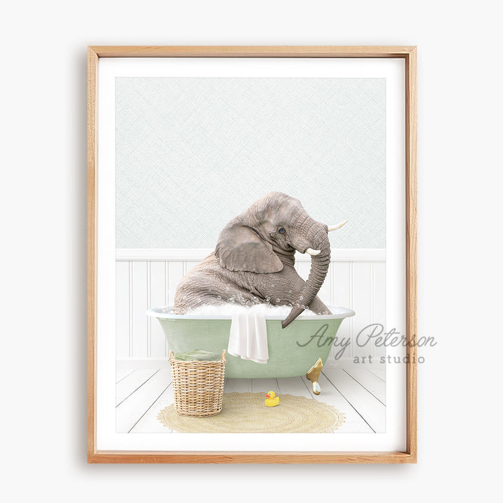 a picture of a baby elephant in a bathtub