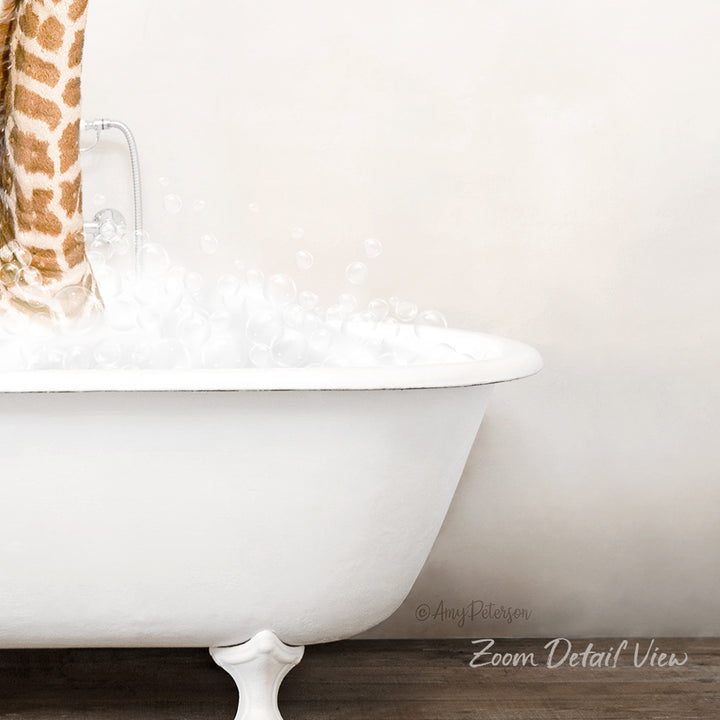 A white claw-foot bathtub filled with soapy water, with a shower curtain featuring a giraffe pattern hanging above it.