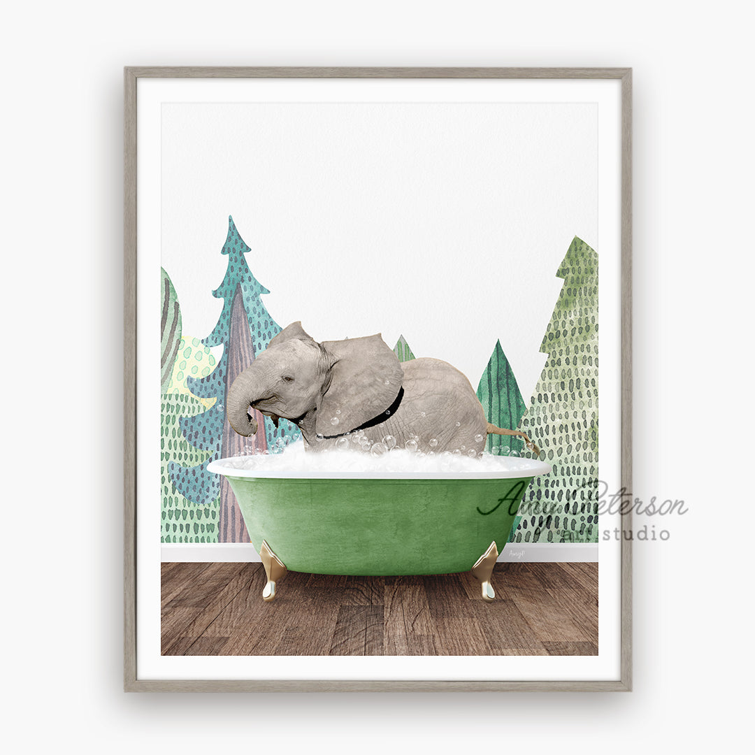 an elephant taking a bath in a green tub