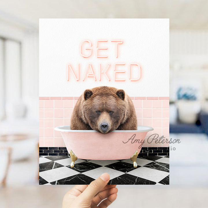 a person holding up a card with a bear in a bathtub