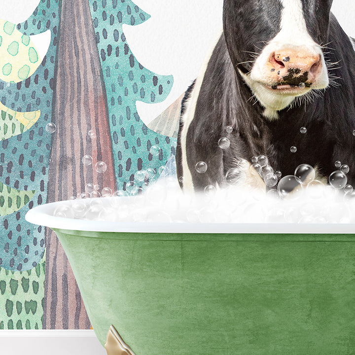 a black and white cow in a green bath tub