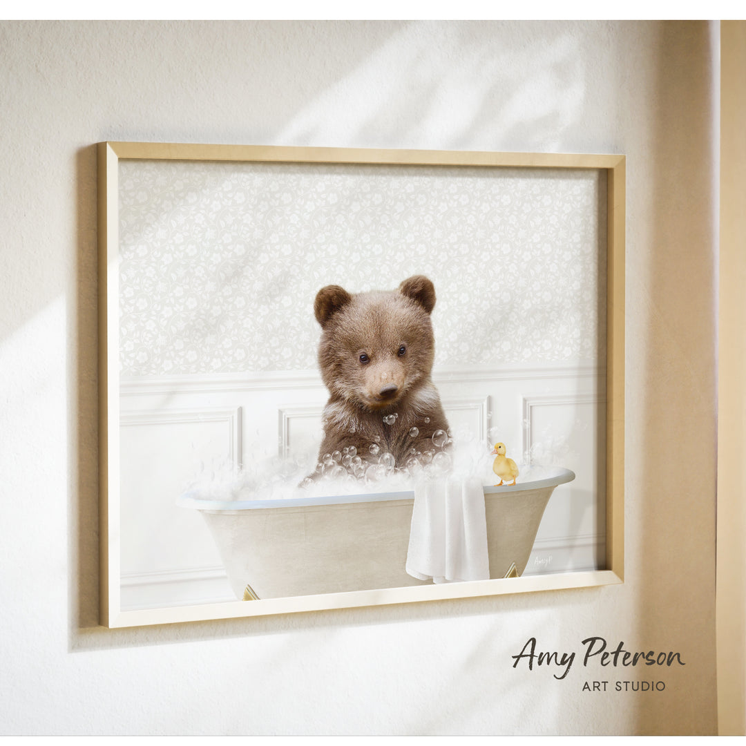 A brown bear sitting in a bathtub filled with bubbles, with a yellow duck nearby.
