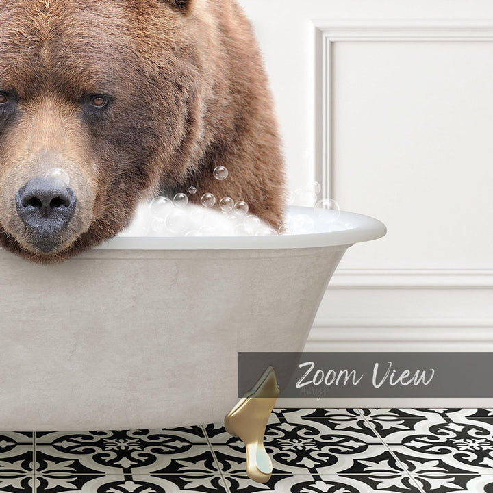 A close-up of a brown bear sitting in a bathtub filled with bubbles, with a text overlay that reads "Zoom View".