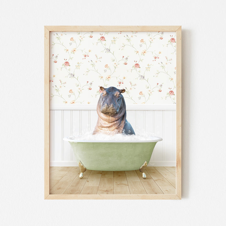 a hippo sitting in a bathtub with a flowered wallpaper behind it