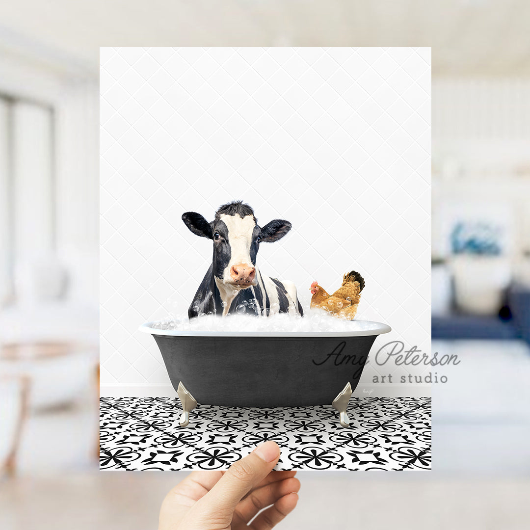 a person holding up a card with a picture of a cow in a bathtub