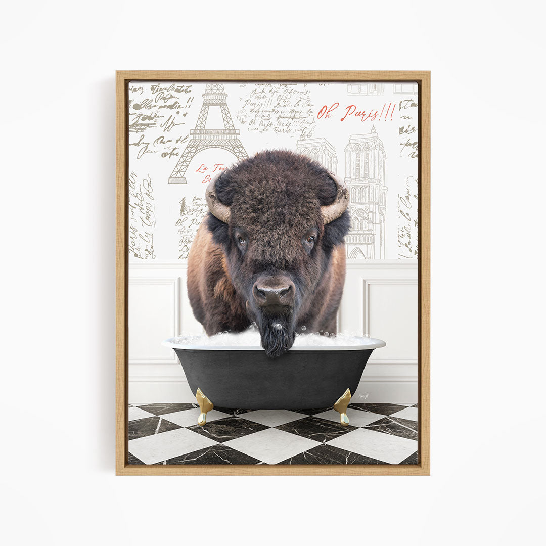 A buffalo is standing in a bathtub filled with water, with a Paris-themed background behind it.