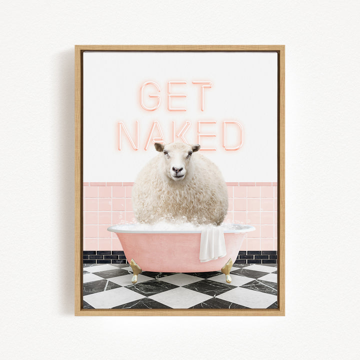 A framed image depicting a white sheep sitting in a pink bathtub, with the text "GET NAKED" displayed above it.
