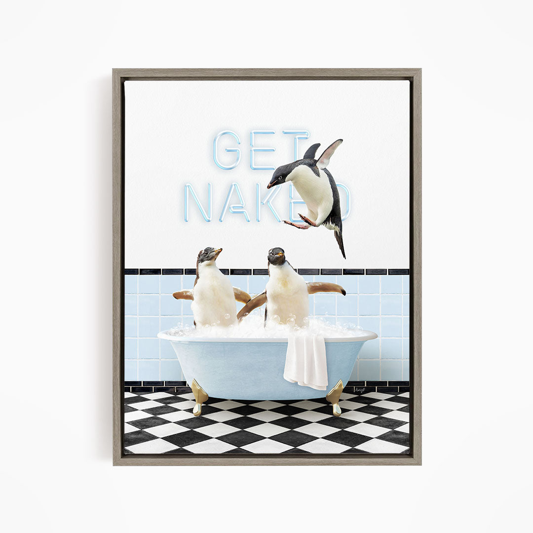 A framed image depicting two penguins sitting in a bathtub, with one penguin jumping out of the tub and the other penguin sitting in the tub. The background features a checkered floor and a sign that says "GET NAKED".
