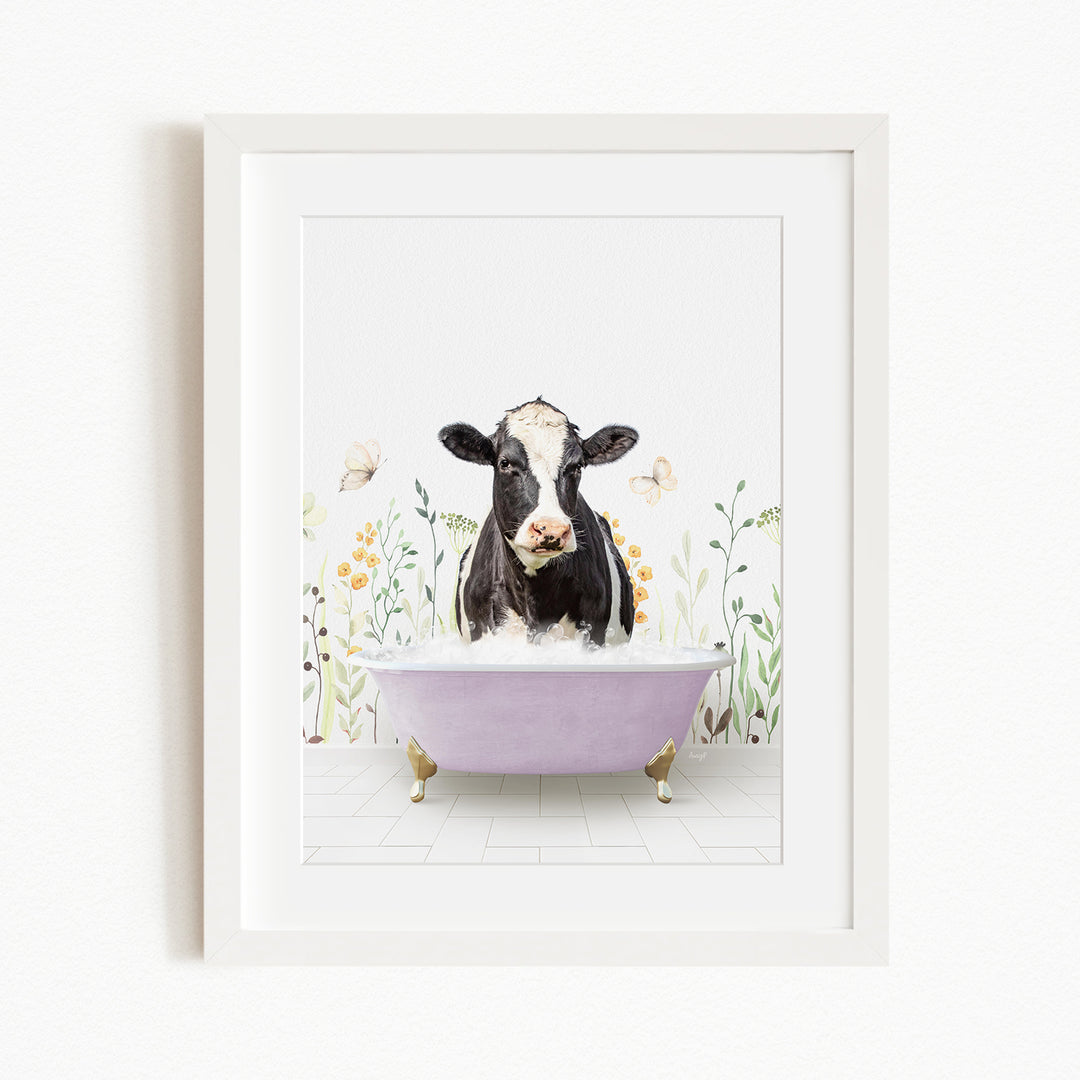 A black and white cow is sitting in a purple bathtub filled with bubbles, surrounded by flowers and butterflies.