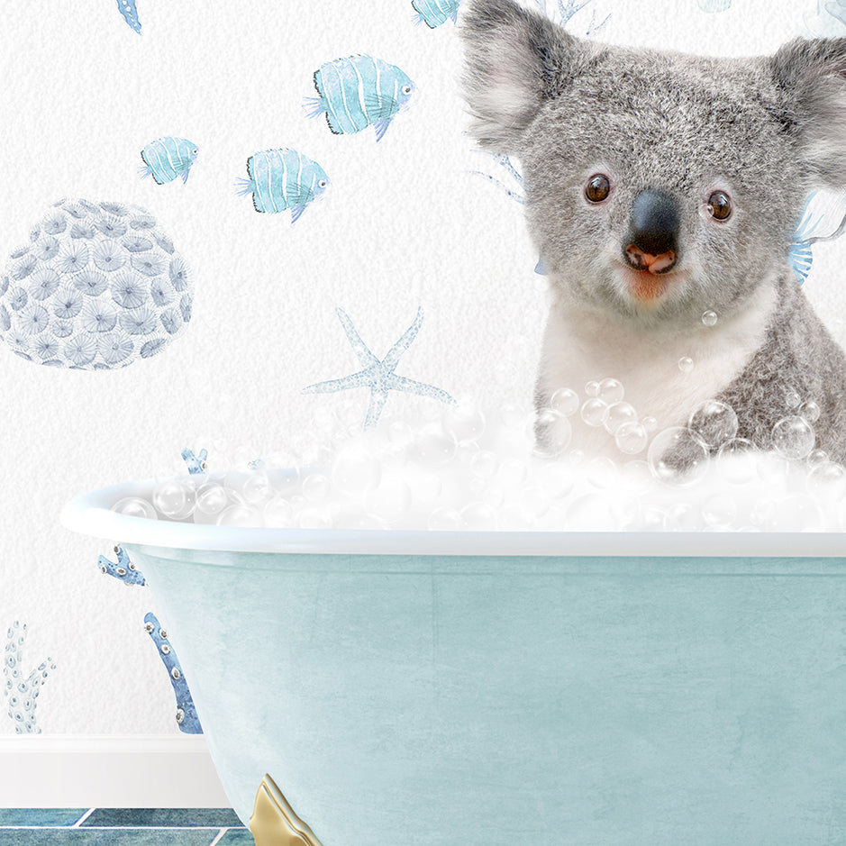 a koala is sitting in a bathtub with bubbles