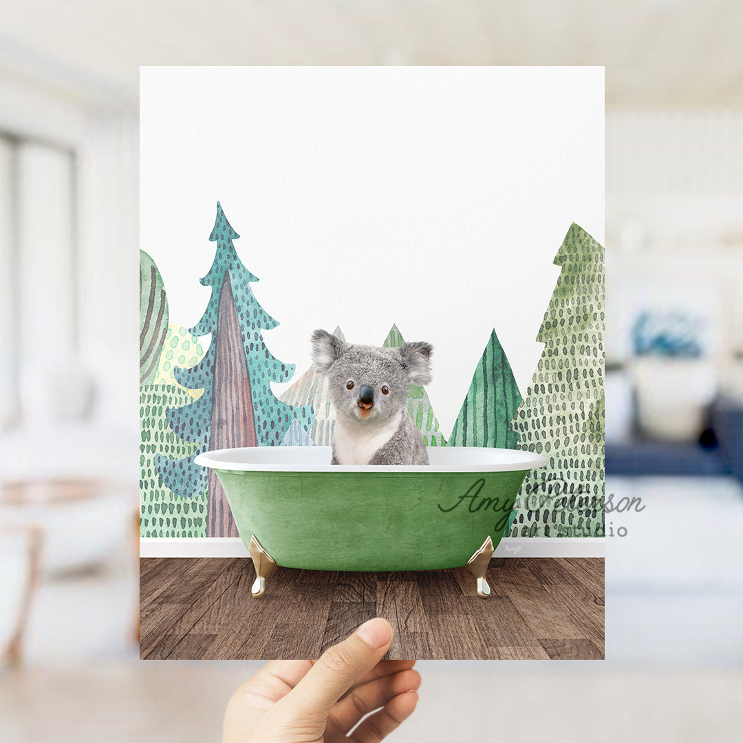 a person holding a card with a picture of a koala in a bathtub