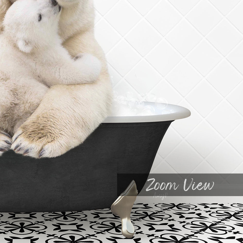 A polar bear sitting in a bathtub, with another polar bear sitting on top of it.