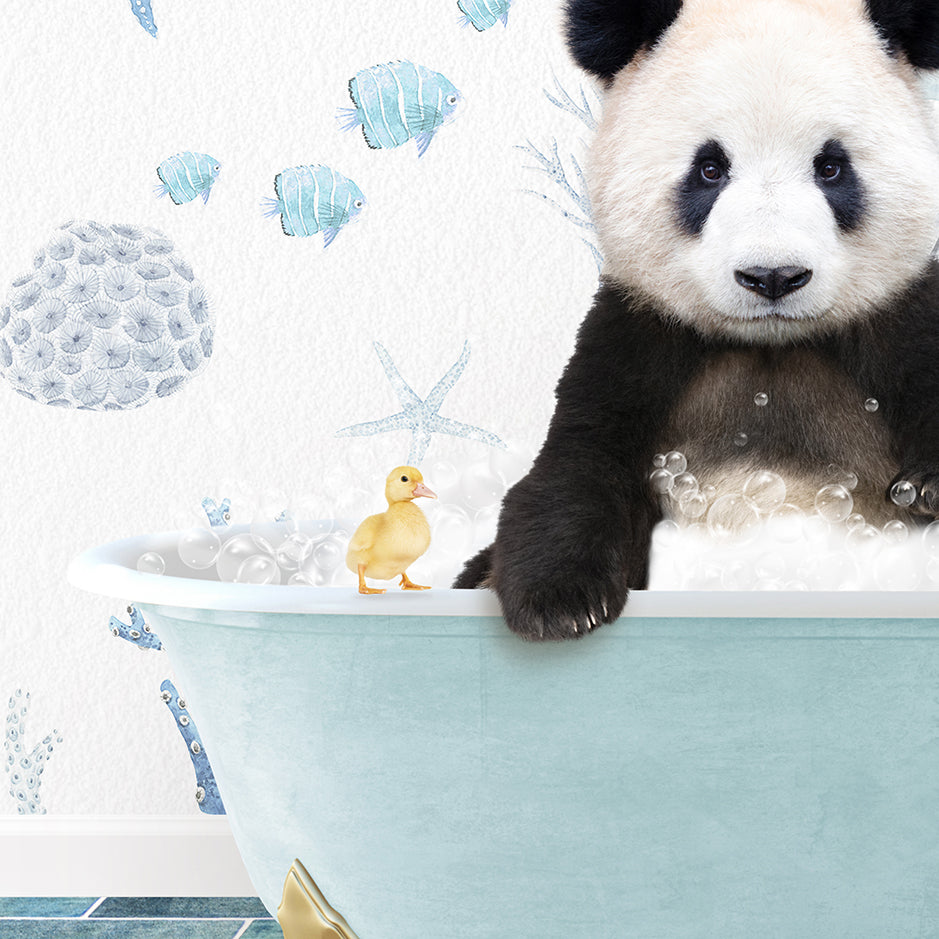 a panda bear sitting in a bathtub with a rubber duck