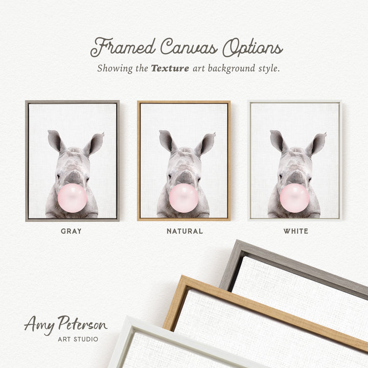 three framed canvas options, each featuring a rhinoceros blowing a bubble with a different colored bubble gum. The options are labeled as "Grays," "Natural," and "White," representing the color of the bubble gum.
