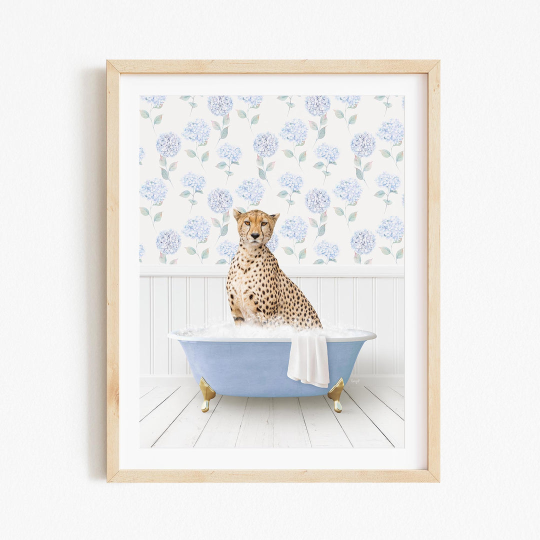 A cheetah sitting in a blue bathtub filled with water, surrounded by a floral pattern on the wall behind it.