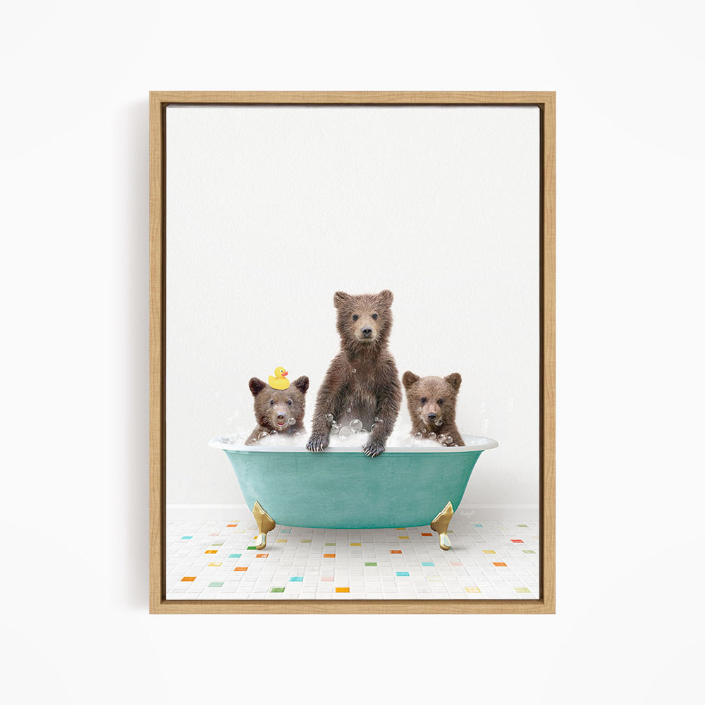 A framed image depicting three bears sitting in a bathtub filled with water, with one bear sitting in the center and two bears sitting on either side.
