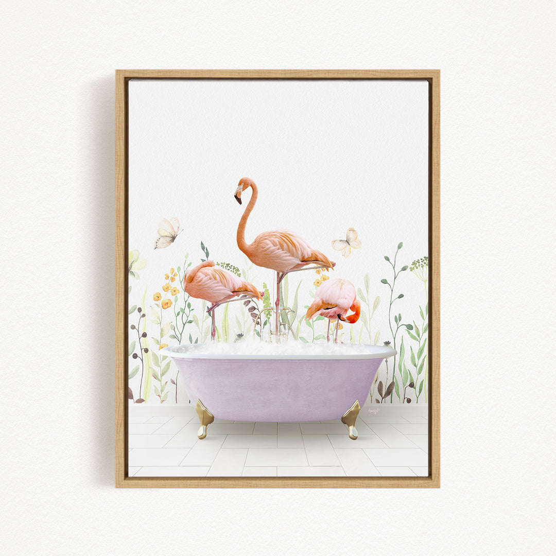 A framed image depicting three flamingos standing in a bathtub filled with water, surrounded by flowers and butterflies.