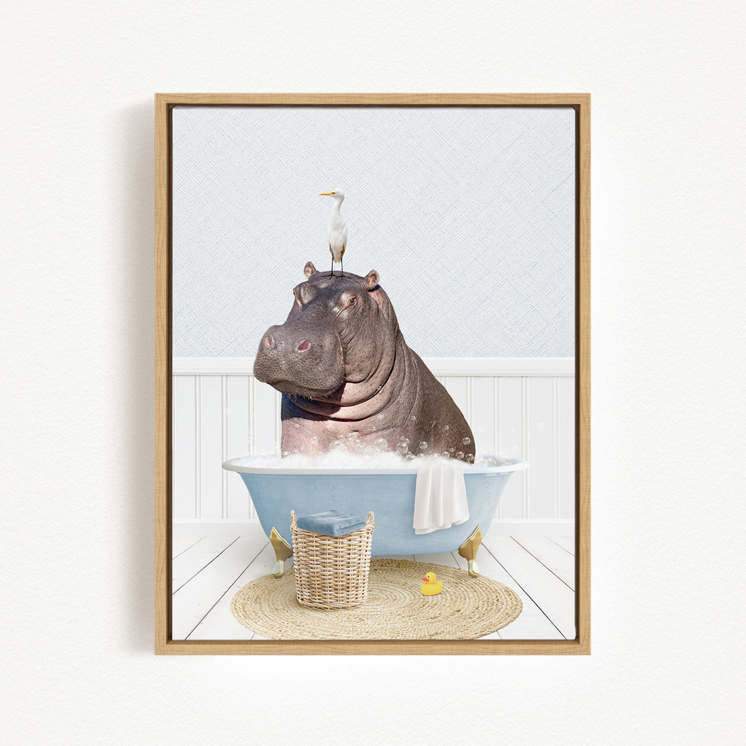 A hippopotamus sitting in a bathtub, with a bird perched on its head, and a basket of rubber ducks nearby.