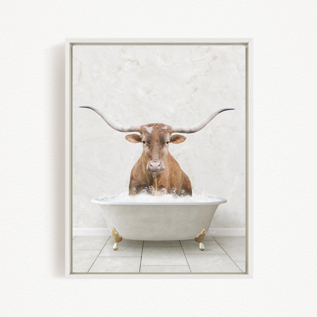 A brown cow with large horns is sitting in a white bathtub filled with water, creating a whimsical and humorous scene.