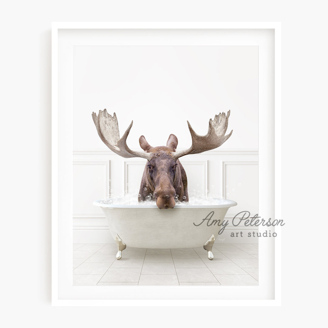 a moose is sitting in a bathtub with his head sticking out