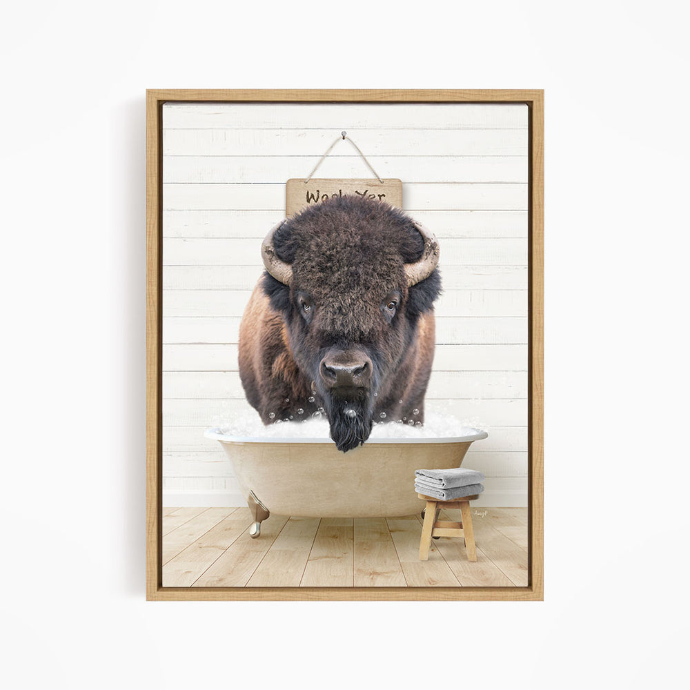 A buffalo is sitting in a bathtub, with a sign above it that says "Worker".