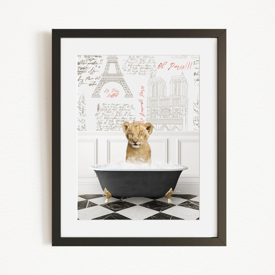 A young lion cub sitting in a bathtub filled with water, surrounded by a checkered floor and a wall with the Eiffel Tower and other Parisian landmarks.