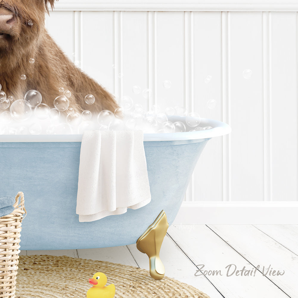 A dog is sitting in a blue bathtub filled with bubbles, surrounded by a yellow rubber duck and a white towel.