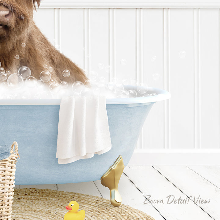 A dog is sitting in a blue bathtub filled with bubbles, surrounded by a yellow rubber duck and a white towel.