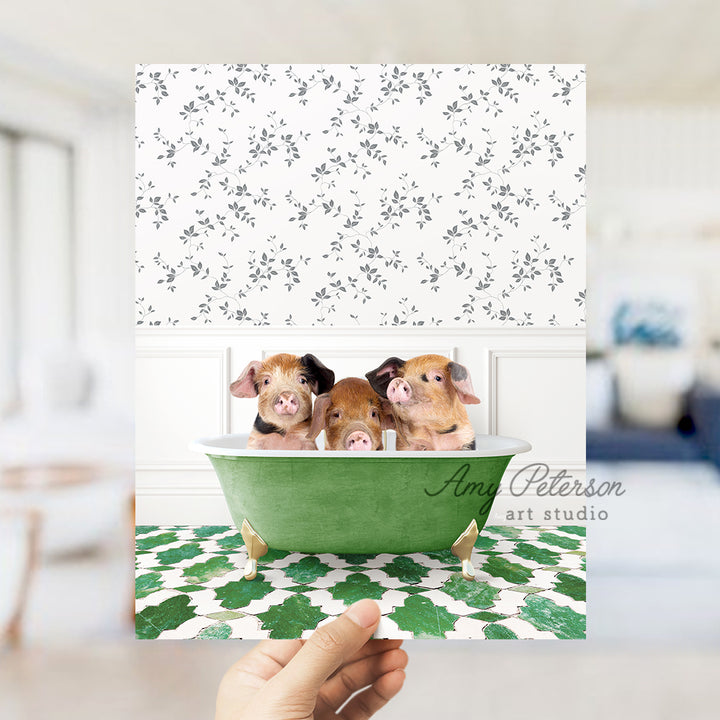 a person holding up a card with three dogs in a bathtub