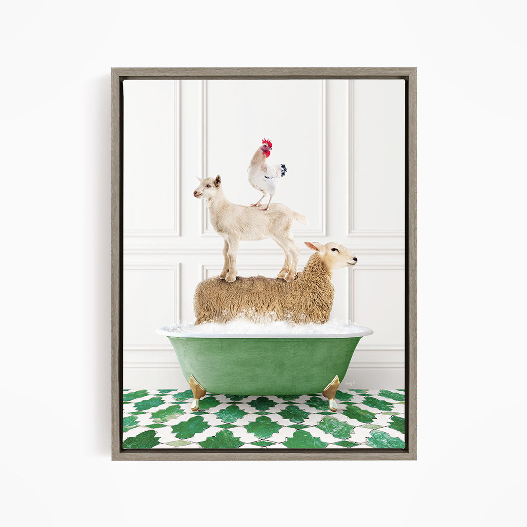 A framed image depicting a sheep standing on a goat's back, with a rooster perched on top of the goat, all atop a green bathtub filled with water.