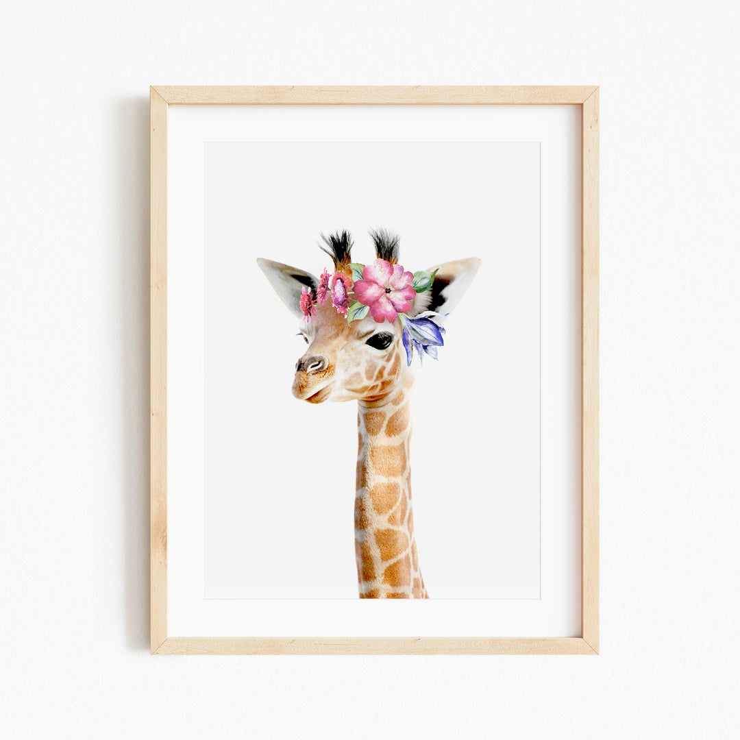a giraffe with a flower crown on its head