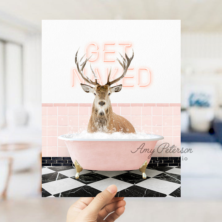 a person holding up a card with a picture of a deer in a bathtub