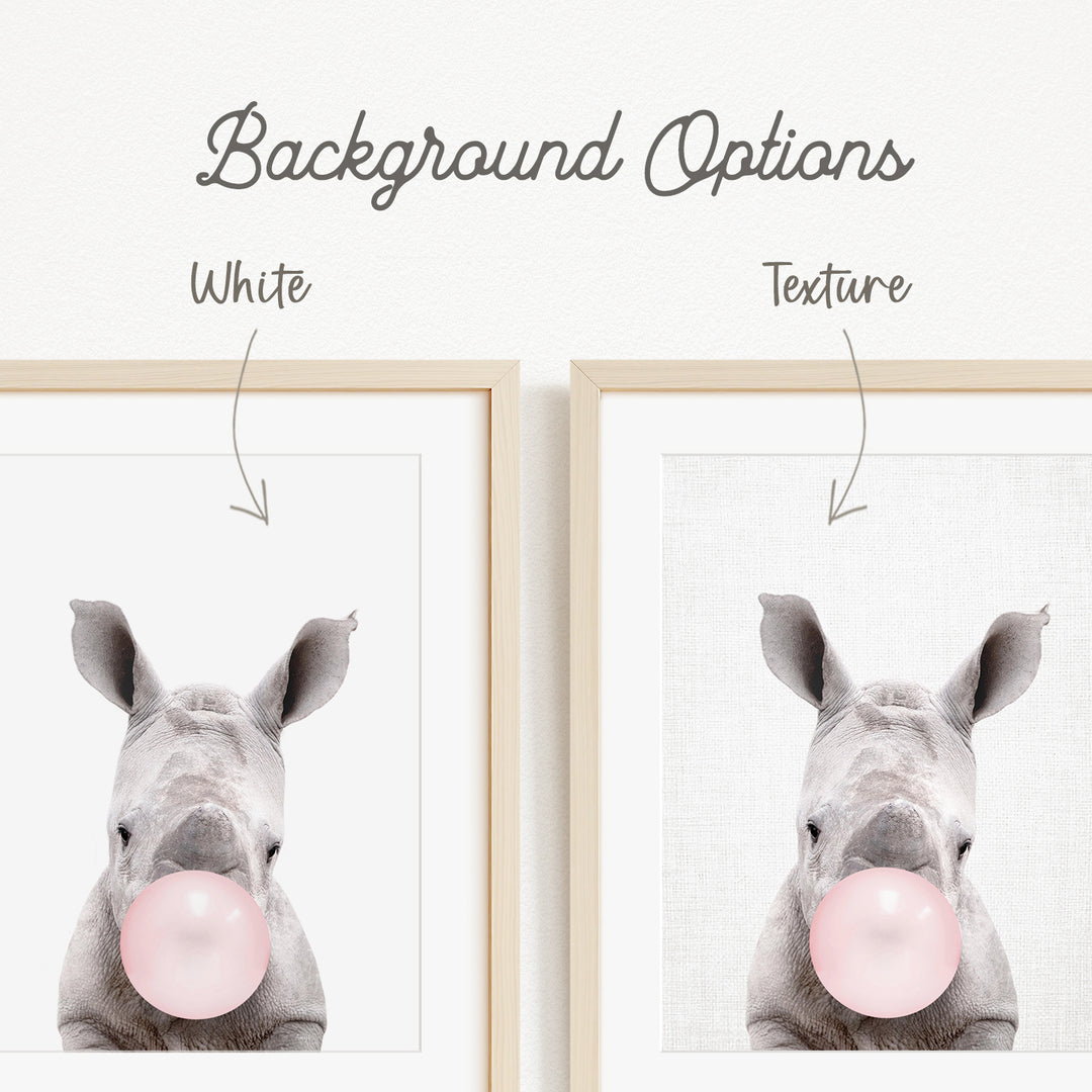 a rhinoceros blowing a bubble with a pink bubble gum bubble.