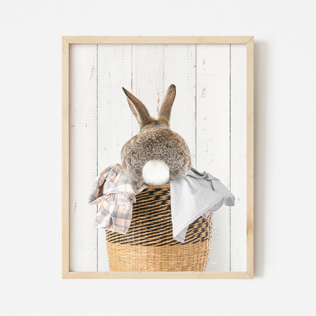 a picture of a stuffed rabbit in a basket