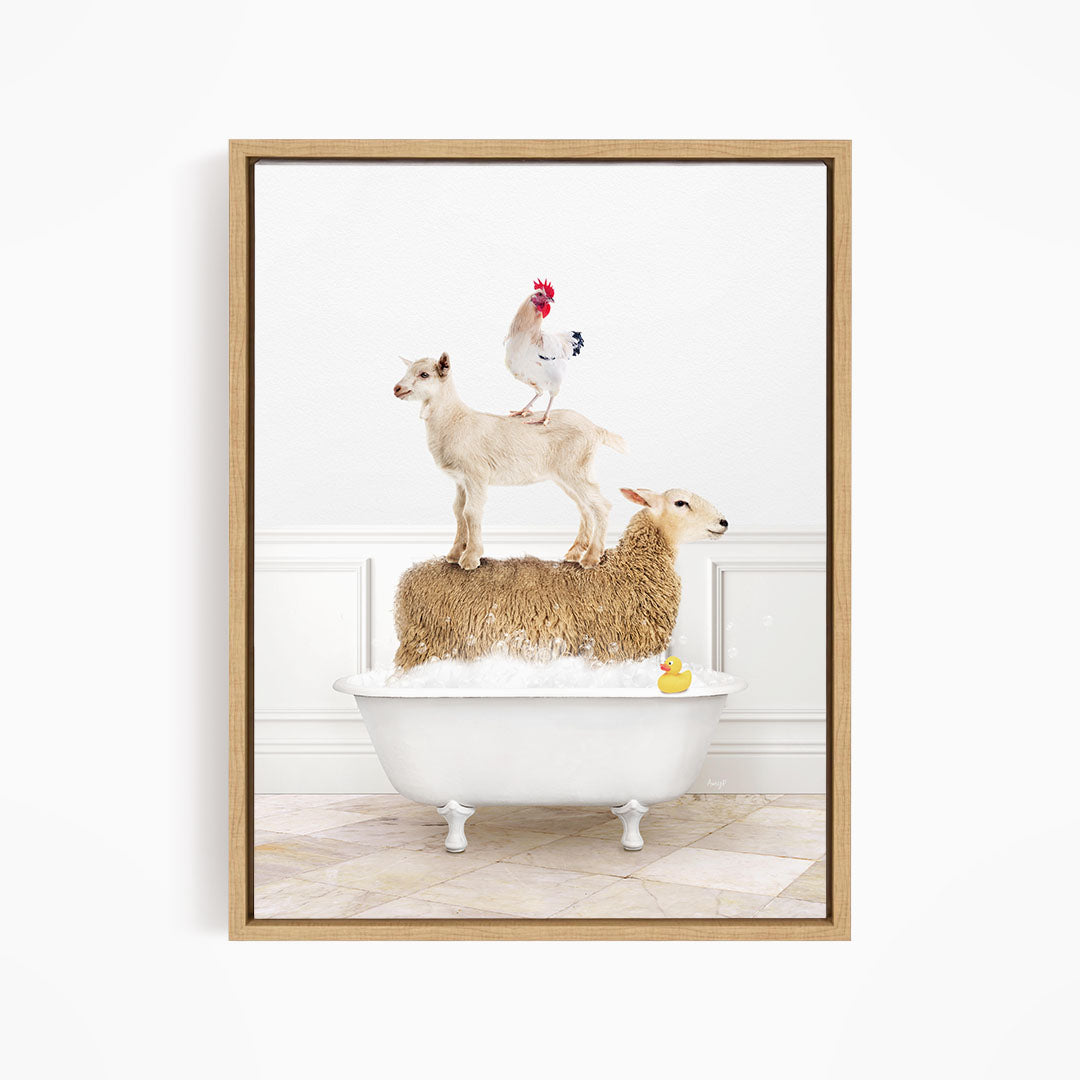 A framed image depicting a sheep standing on a chicken's back while a lamb sits in a bathtub, with a rubber duck floating in the water.